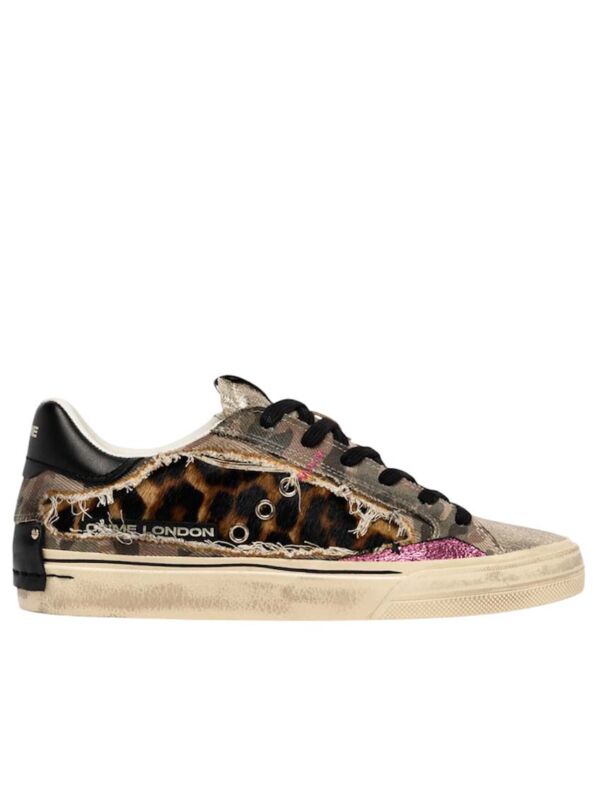 Profil de la Basket Crime London Léopard Doré Militaire 23076AA9 Stylée et Elégante alliant imprimé léopard, toile motif camouflage militaire et cuir métallisé doré. Sneaker de créateur au design déstructuré avec semelle vintage effet usé pour un look rock et streetwear chic.